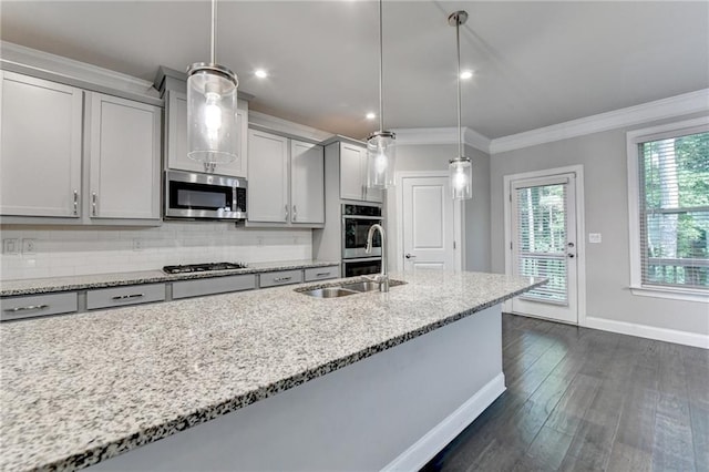 4232 Perimeter Park E Unit 110, Atlanta, GA 30341 - kitchen featuring appliances with stainless steel finishes, ornamental molding, dark wood-type flooring, tasteful backsplash, and light stone counters