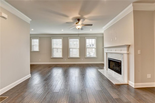 4232 Perimeter Park E Unit 110, Atlanta, GA 30341 - unfurnished living room with ceiling fan, crown molding, plenty of natural light, a premium fireplace, and dark wood-style floors