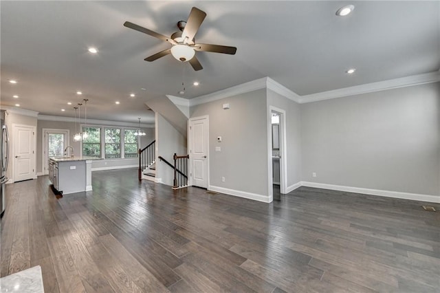 4232 Perimeter Park E Unit 110, Atlanta, GA 30341 - unfurnished living room featuring crown molding, stairs, a ceiling fan, recessed lighting, and dark wood-style floors