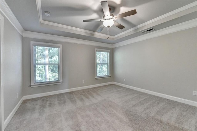 4232 Perimeter Park E Unit 110, Atlanta, GA 30341 - carpeted spare room featuring a raised ceiling, healthy amount of natural light, ornamental molding, ceiling fan, and a smoke detector