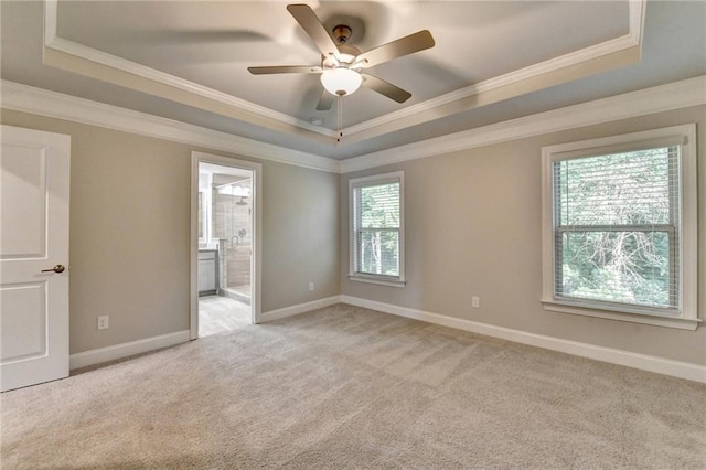 4232 Perimeter Park E Unit 110, Atlanta, GA 30341 - unfurnished room featuring a raised ceiling, light colored carpet, ceiling fan, and ornamental molding