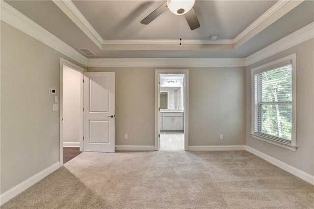 4232 Perimeter Park E Unit 110, Atlanta, GA 30341 - empty room with a tray ceiling, ornamental molding, carpet floors, and a ceiling fan