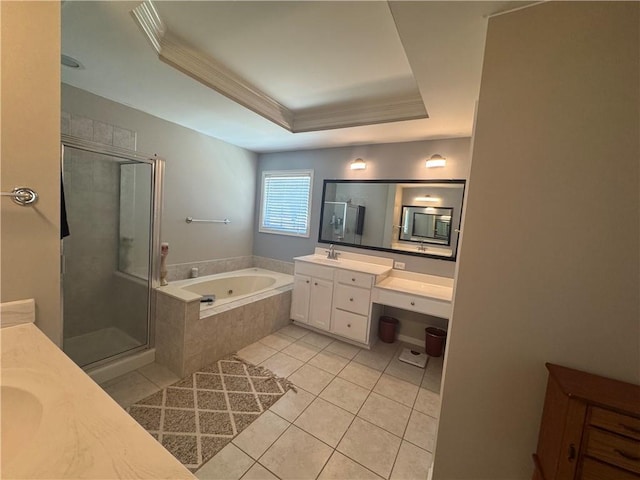 bathroom featuring crown molding, a shower stall, tile patterned floors, a tray ceiling, and a jetted tub