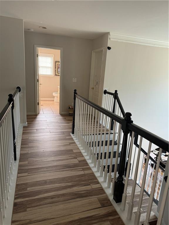 hall with dark hardwood / wood-style floors