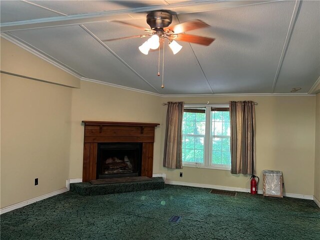 unfurnished living room featuring lofted ceiling, carpet floors, ceiling fan, and ornamental molding