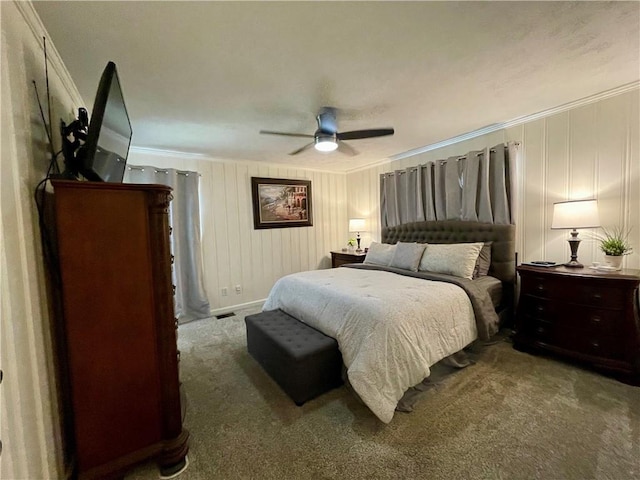 carpeted bedroom with ceiling fan and crown molding