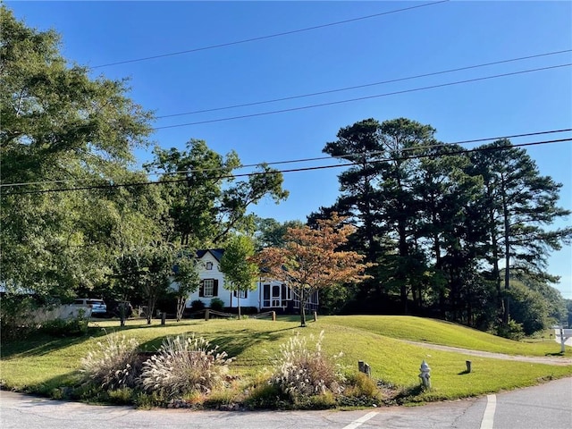 view of front of home with a front yard