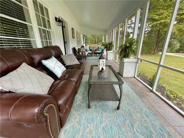 sunroom / solarium with vaulted ceiling