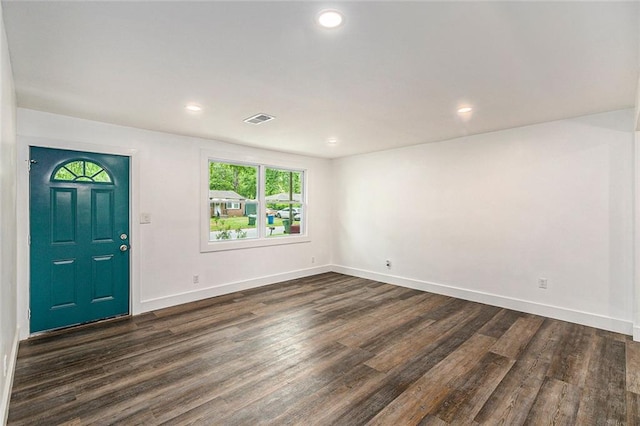 entrance foyer with dark hardwood / wood-style flooring