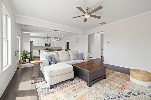 1998 Lakeview Bend Way, Buford, GA 30519 - living room with ceiling fan, dark wood-style flooring, ornamental molding, and stairway