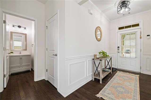 1998 Lakeview Bend Way, Buford, GA 30519 - foyer entrance with ornamental molding, dark wood-style floors, a wainscoted wall, and a decorative wall