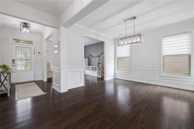 1998 Lakeview Bend Way, Buford, GA 30519 - entryway with dark wood-style floors, stairs, a wainscoted wall, a decorative wall, and ornamental molding