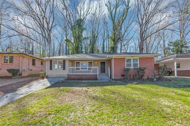 single story home featuring a porch, a front yard, crawl space, and brick siding