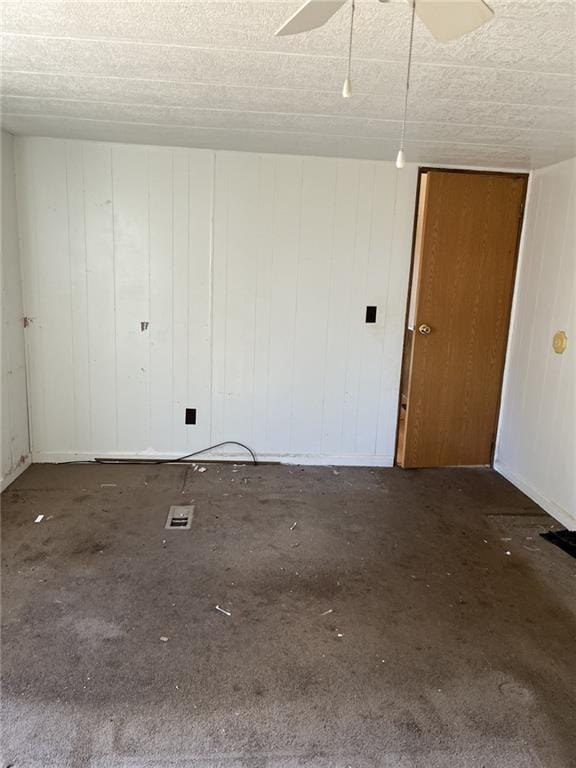 unfurnished room featuring ceiling fan