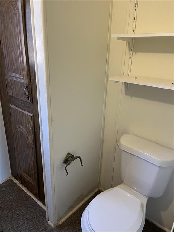 bathroom featuring toilet