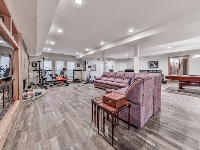 living room with billiards, recessed lighting, and wood finished floors