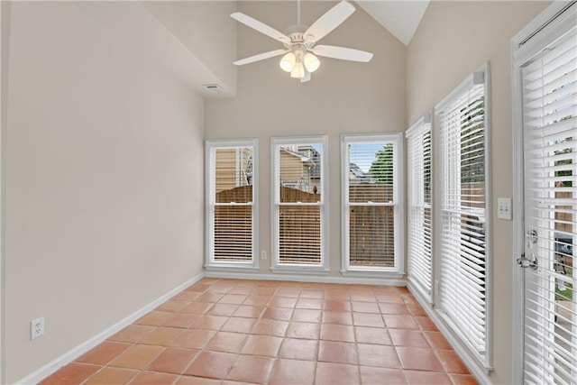 1712 Bonnabel Trce NE, Marietta, GA 30066 - unfurnished sunroom featuring lofted ceiling, tile patterned floors, and baseboards