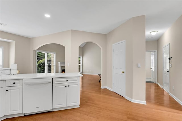 1712 Bonnabel Trce NE, Marietta, GA 30066 - kitchen featuring dishwasher, light wood-style flooring, white cabinetry, baseboards, and recessed lighting