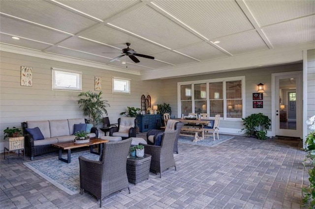 view of patio with outdoor lounge area and ceiling fan