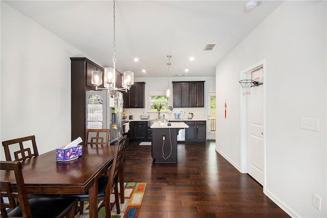 2517 Hedgeway Cir, Kennesaw, GA 30144 - dining space with a chandelier, dark wood finished floors, recessed lighting, and baseboards