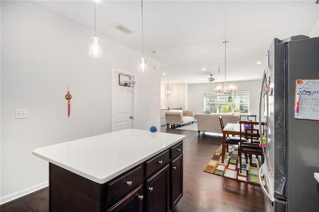 2517 Hedgeway Cir, Kennesaw, GA 30144 - kitchen featuring freestanding refrigerator, dark wood finished floors, light countertops, a center island, and recessed lighting