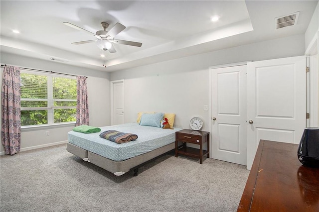 2517 Hedgeway Cir, Kennesaw, GA 30144 - bedroom featuring a raised ceiling, carpet floors, ceiling fan, recessed lighting, and baseboards