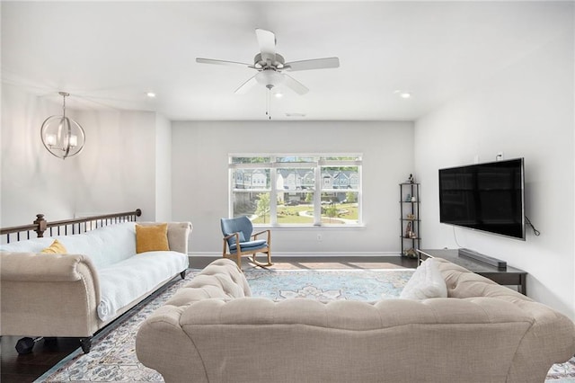 2517 Hedgeway Cir, Kennesaw, GA 30144 - living room featuring recessed lighting, baseboards, ceiling fan, a chandelier, and wood finished floors