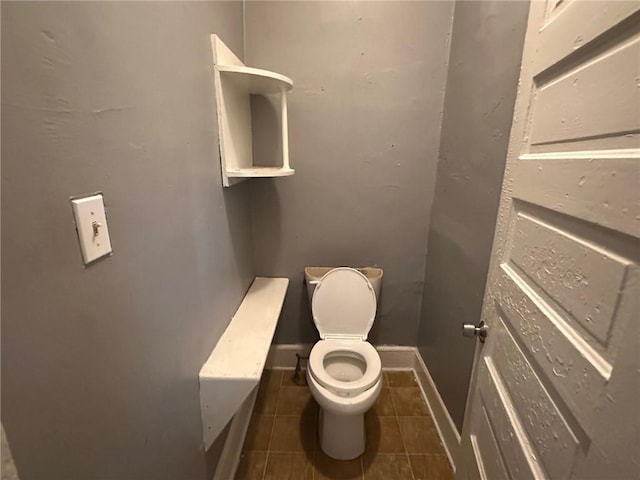 6 Hazel St, Porterdale, GA 30014 - bathroom featuring tile patterned flooring and toilet