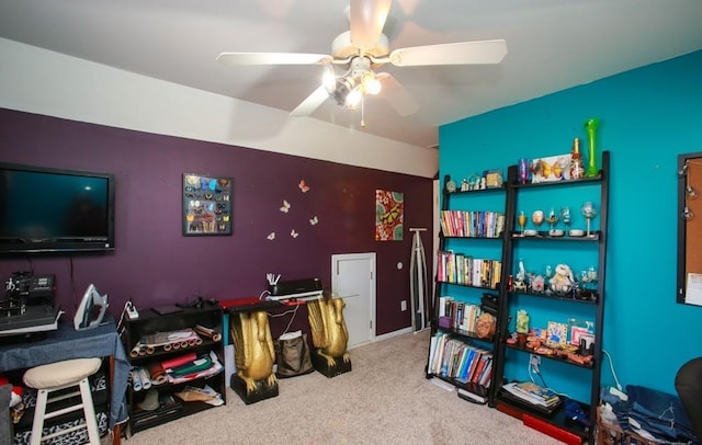 office area with ceiling fan and carpet