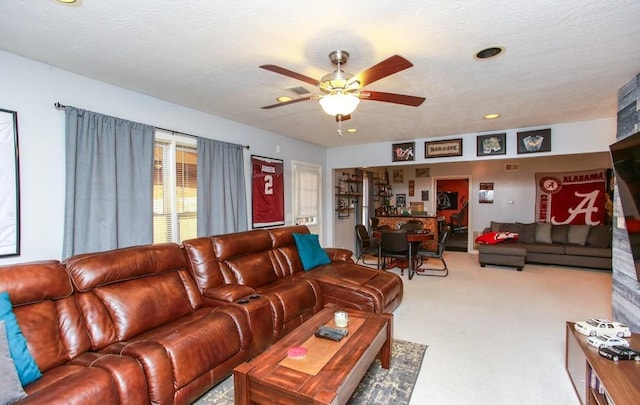carpeted living area featuring recessed lighting and ceiling fan