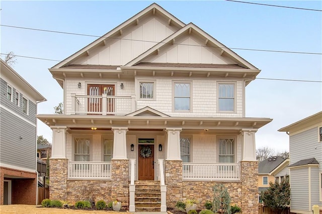 view of front of home with a balcony and a porch