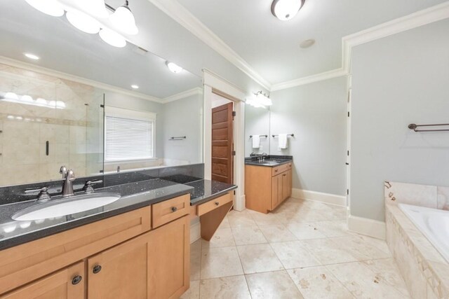 bathroom with vanity, shower with separate bathtub, and crown molding