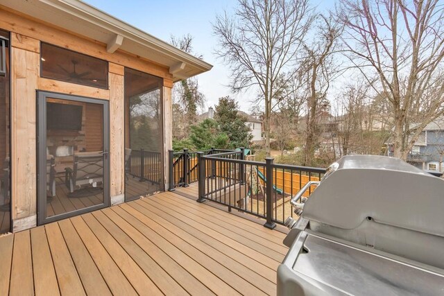 deck with a sunroom