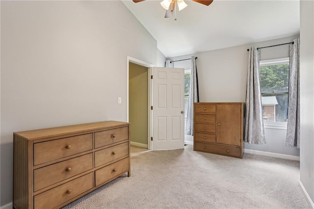 208 Hembree Park Ter, Roswell, GA 30076 - bedroom with vaulted ceiling, light colored carpet, and a ceiling fan