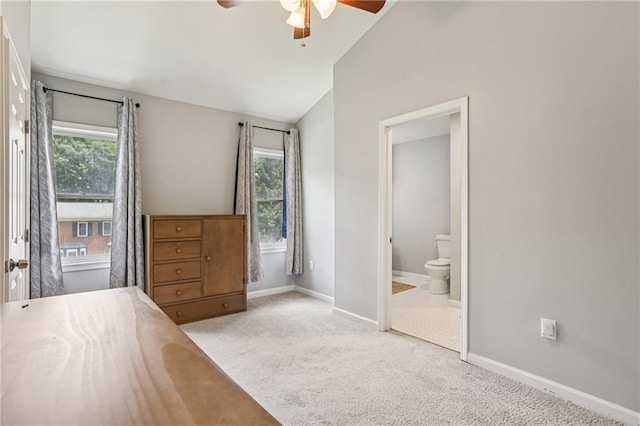 208 Hembree Park Ter, Roswell, GA 30076 - carpeted bedroom with multiple windows, lofted ceiling, ensuite bathroom, and a ceiling fan