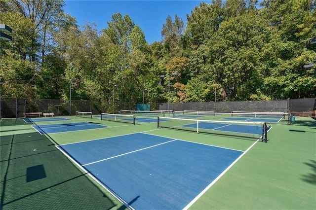 view of tennis court with basketball court