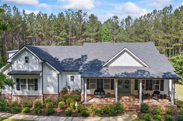 726 Swilling Rd, Eastanollee, GA 30538 - modern farmhouse style home with board and batten siding, a shingled roof, and a porch