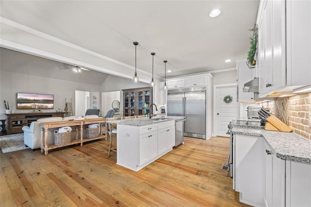 726 Swilling Rd, Eastanollee, GA 30538 - kitchen featuring under cabinet range hood, a sink, appliances with stainless steel finishes, white cabinetry, and ornamental molding