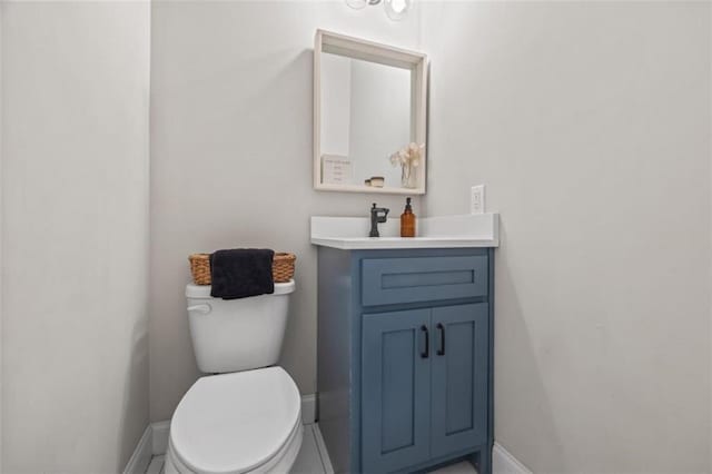 726 Swilling Rd, Eastanollee, GA 30538 - bathroom with toilet, vanity, and baseboards
