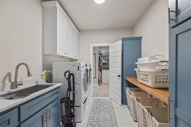726 Swilling Rd, Eastanollee, GA 30538 - washroom with washing machine and dryer, cabinet space, and light tile patterned floors