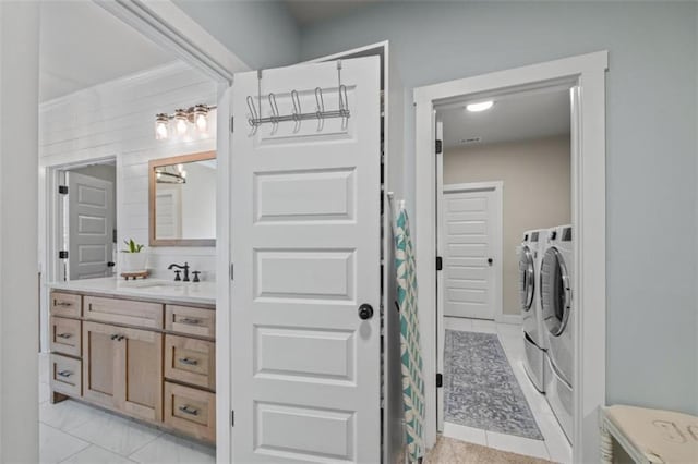 726 Swilling Rd, Eastanollee, GA 30538 - bathroom with washing machine and clothes dryer, vanity, and tile patterned flooring