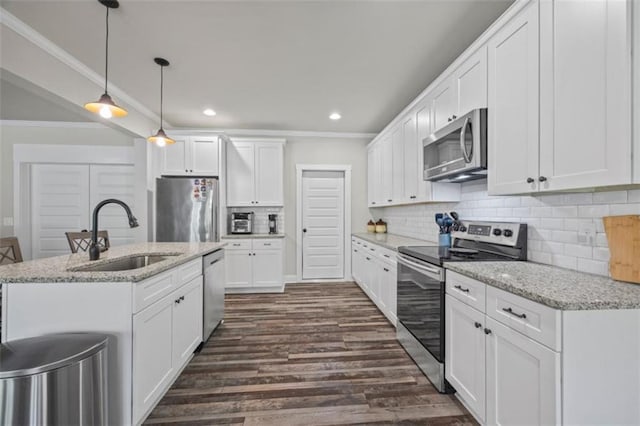 726 Swilling Rd, Eastanollee, GA 30538 - kitchen with appliances with stainless steel finishes, a sink, ornamental molding, pendant lighting, and white cabinets