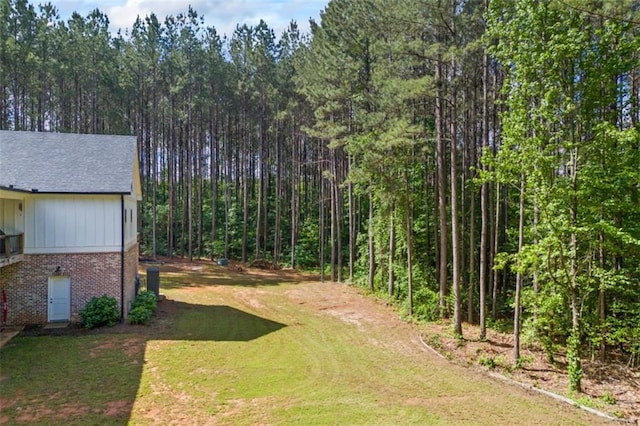 726 Swilling Rd, Eastanollee, GA 30538 - view of grassy yard with a wooded view