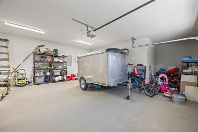 726 Swilling Rd, Eastanollee, GA 30538 - garage featuring a garage door opener