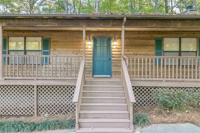 property entrance with a porch