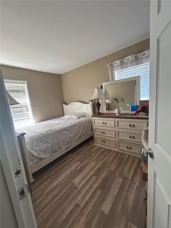 living room with dark hardwood / wood-style floors