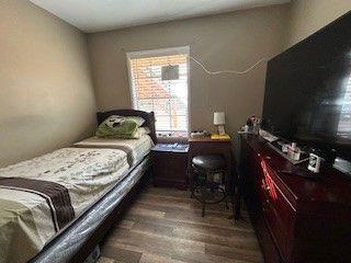 living room with dark wood-type flooring