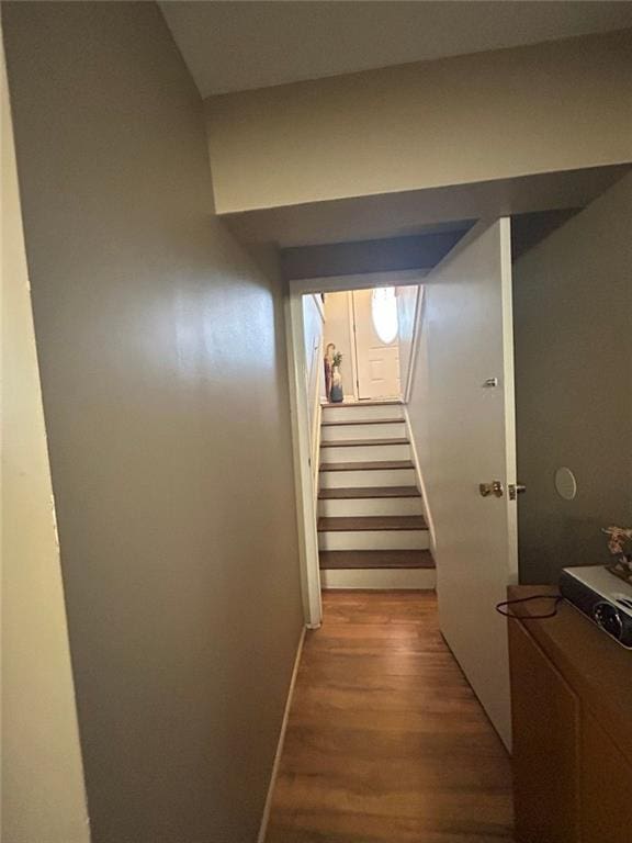 bedroom with dark hardwood / wood-style flooring