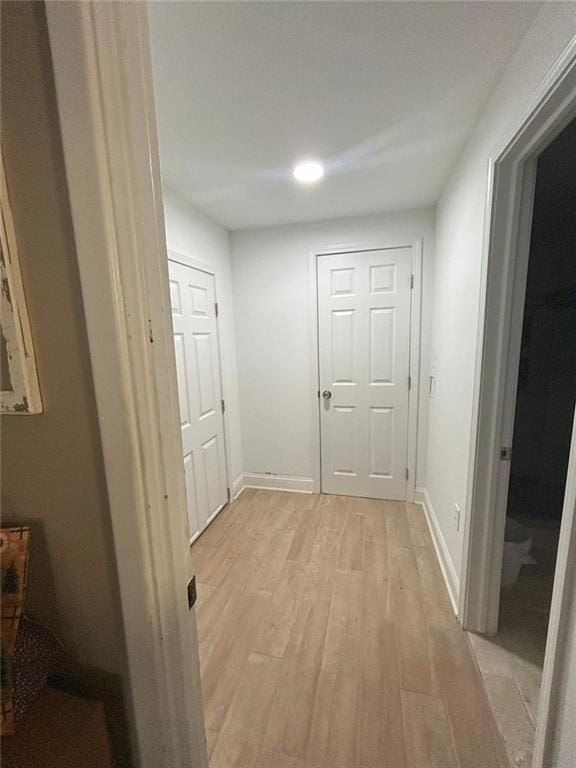 sitting room with light hardwood / wood-style flooring