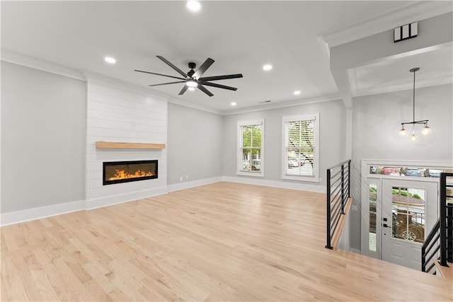 3932 Boston Common St, Suwanee, GA 30024 - unfurnished living room with crown molding, recessed lighting, wood finished floors, a chandelier, and a ceiling fan
